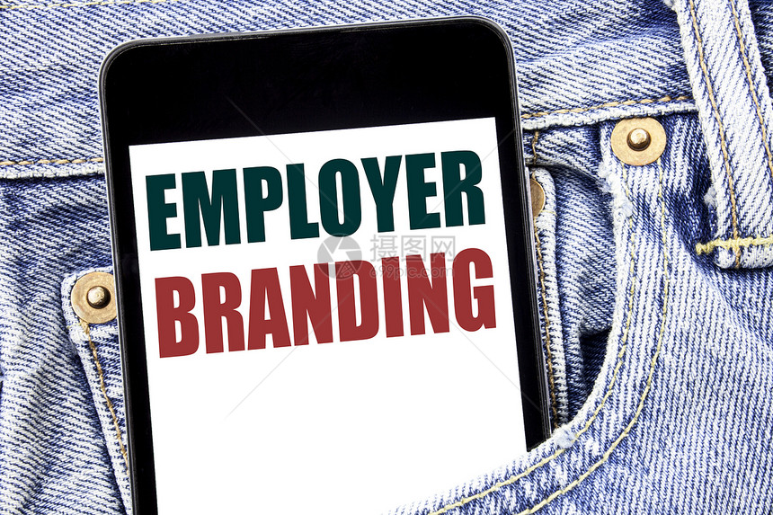 手写文字标题灵感显示雇主品牌品牌建设的商业理念写在牛仔裤子的智能手机图片