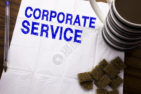 手写文字标题显示企业服务Csr数字内容的商业概念写在木制背景的纸巾上图片