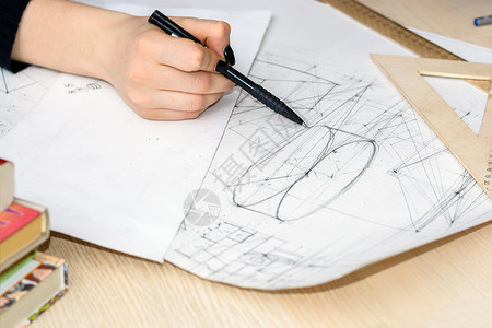 建筑设计师亲手绘制草图蓝图建筑工程研究概图片