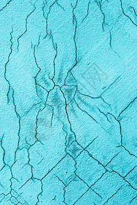 白蓝色破碎墙的纹理小直径油漆表面的直接骨图片