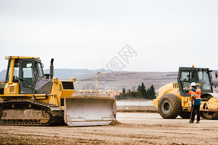 工业重型机械挖土机和工程建筑高速公路的图片