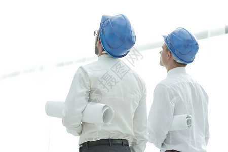 商业背景建筑师和建造者在看建筑背景图片