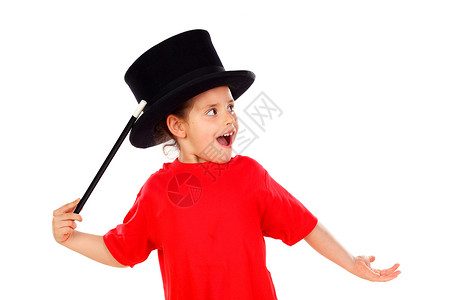 美丽的小女孩用顶帽子和魔法杖施法孤立图片