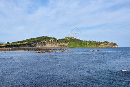 韩国济州岛松岳山的侧视图图片