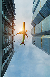 飞机越城市建筑图片