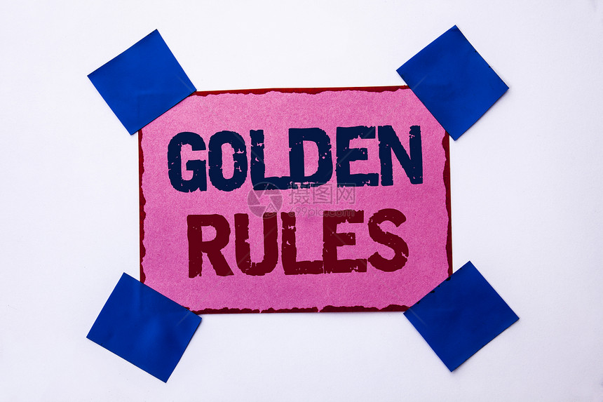 显示黄金法则的概念手写商业照片文本监管原则核心目的计划规范政策声明写成粉红色便条纸图片