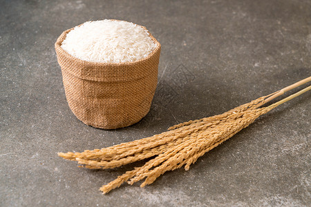 白色未加工的泰国茉莉香米背景图片
