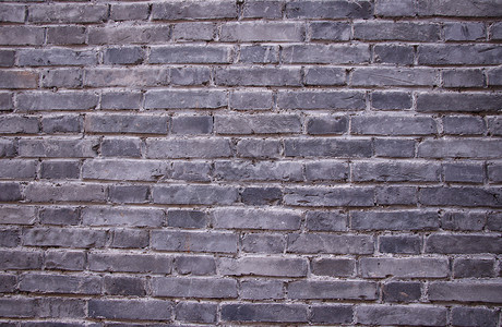 云南省丽江古城石砖墙背景图片