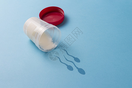 带有精子分析的试管会留下带有精子的阴影背景图片