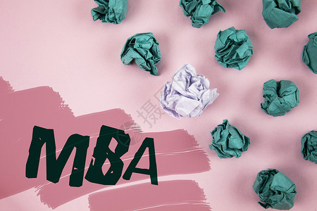 手写文本Mba概念意思是大学习后工商管理硕士高级学位写成粉红色背景图片