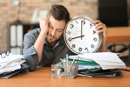工作时间计时的疲劳商人时间管图片