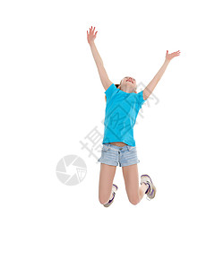 一个小女孩体操运动员高兴地跳起来图片
