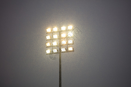 电线杆户外雪天之夜的球场灯光图片