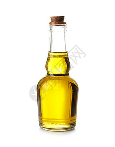 白色背景上装有橄榄油的玻璃瓶图片