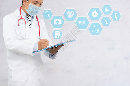 医生用健康图标书写和填充病人的再登记表格保健医疗和护理概图片