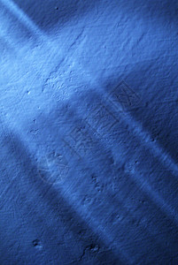 用月光拍摄粗墙纹理的彩色深夜摄影蓝色照片摘图片