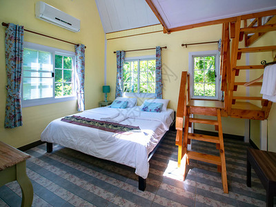 旅馆度假村的内地有床和图片