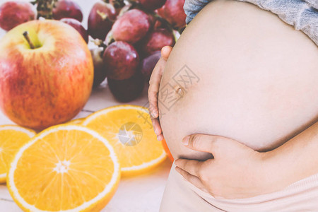 孕妇和健康食品背景图片