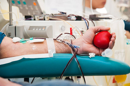 医院化验室捐赠者输血献单位期间的医生背景图片
