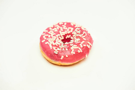 美味的粉红色甜圈白色背景图片