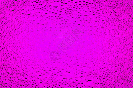粉红色梯度底部的水滴紧贴着水滴图片