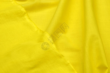 亮黄色棉质面料添加弹纤维用于衬衫背景图片