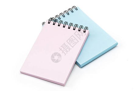 蓝色和粉红色空白模板螺旋滚动白笔记本纸背景图片