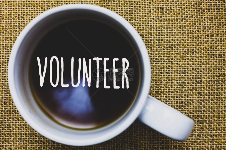 手写文字书写志愿者概念意义志愿个人为更大的社会事业服务他人杯子咖啡思想创意灵感漂亮的图片