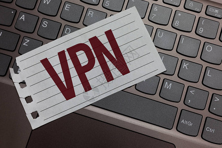 Vpn商业图片展示在保密域保护下跨安全虚拟私人网络的Keyboard彩色灰纸键膝上型笔背景图片