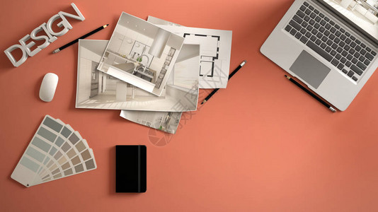 建筑师设计师概念带电脑的红色办公桌纸稿厨房项目图像和蓝图图片