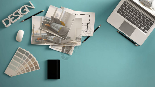 建筑师设计师概念带电脑的蓝色办公桌纸稿卧室项目图像和蓝图背景图片