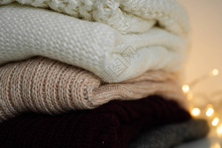 温暖的针织毛衣温暖背景下的针织服装毛衣针织品文字空图片