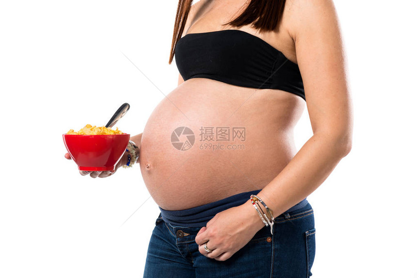 拿着一碗麦片的孕妇图片