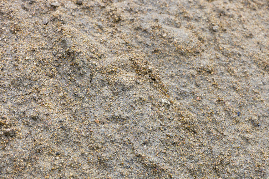 形成在海滩上的波纹沙子图片