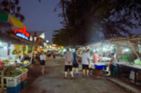 为背景使用模糊节日美食夜市图片