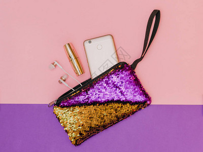 紫色配金色女式手提包图片