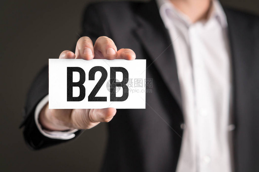 B2B和企业对企业营销概念商人持有图片