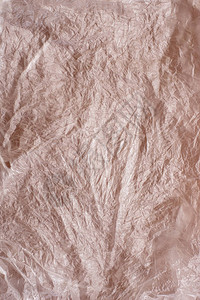 棕色表面透明折面塑料袋的背图片