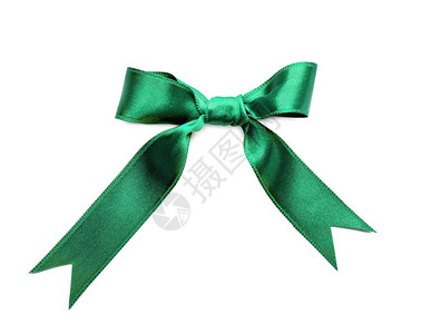 从白色背景上的绿色缎带弓背景图片