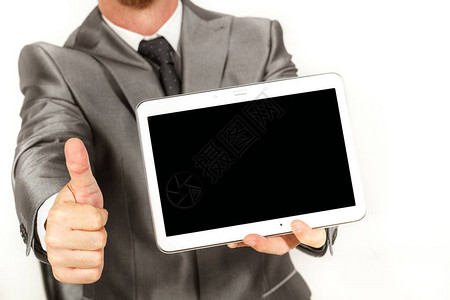 使用平板电脑并竖起大拇指的人图片