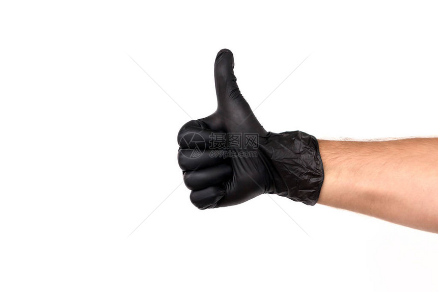 在白色背景上的黑色橡胶手套中隔离手势拇指向上或喜欢外科医生或清洁厨师成图片
