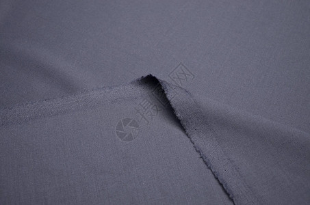 羊毛和弹纤维制成的深蓝色面料套装图片