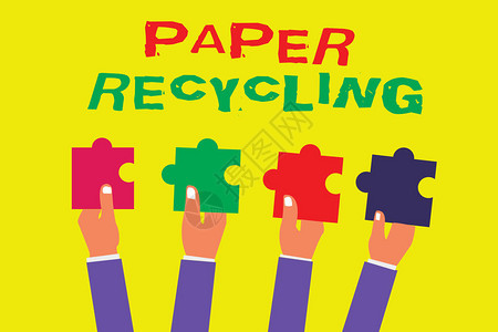 概念手写显示纸张回收商业照片展示了通过回收废纸以新的图片