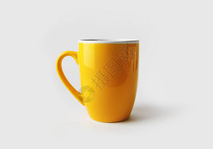 空黄色茶杯或咖啡杯反图片