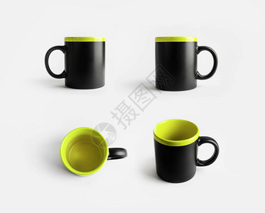 黑色和浅绿色陶瓷杯咖啡杯或茶杯反图片
