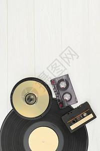 黑胶唱片光盘和录音带乙烯基板CD光盘盒式磁带和复制空间图片