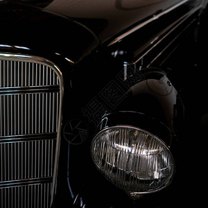 古董稀有老式黑色汽车的前灯图片