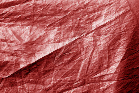 红色的破碎塑料纺织品纹理设计的背景和纹图片