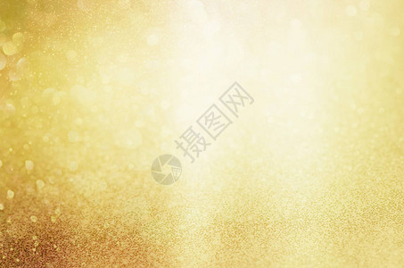 金黄色闪亮的圣诞灯光模背景图片