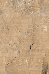 天气湿的石灰岩面对地质壁纸背景显示出图片
